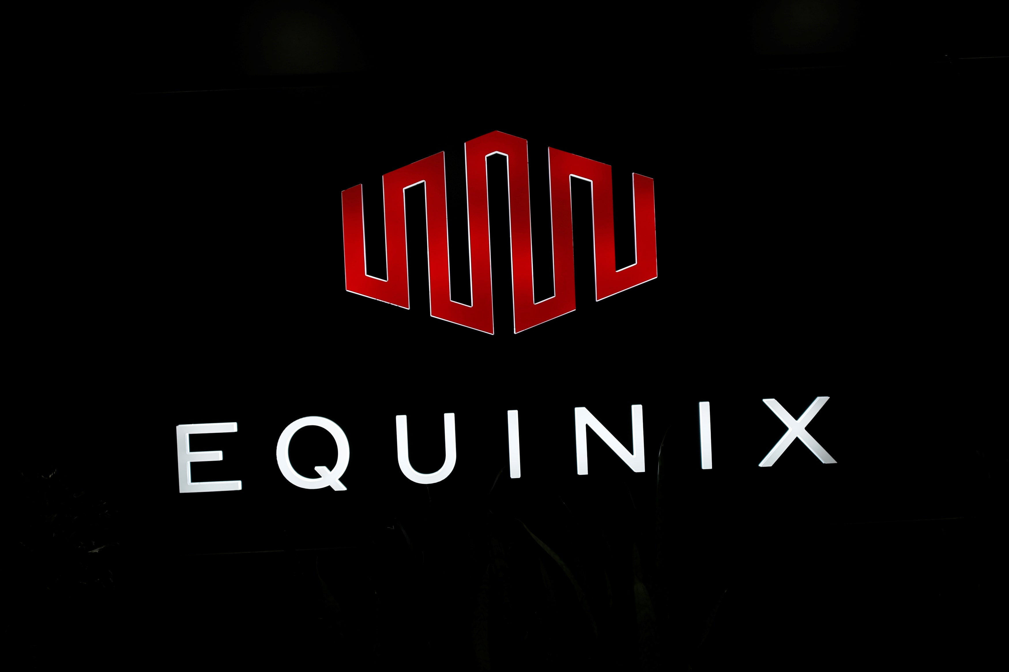 The logo of Equinix is pictured at the entrance of a data center in Pantin